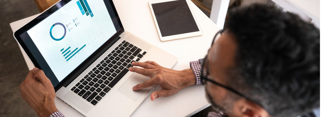 Man typing on a laptop