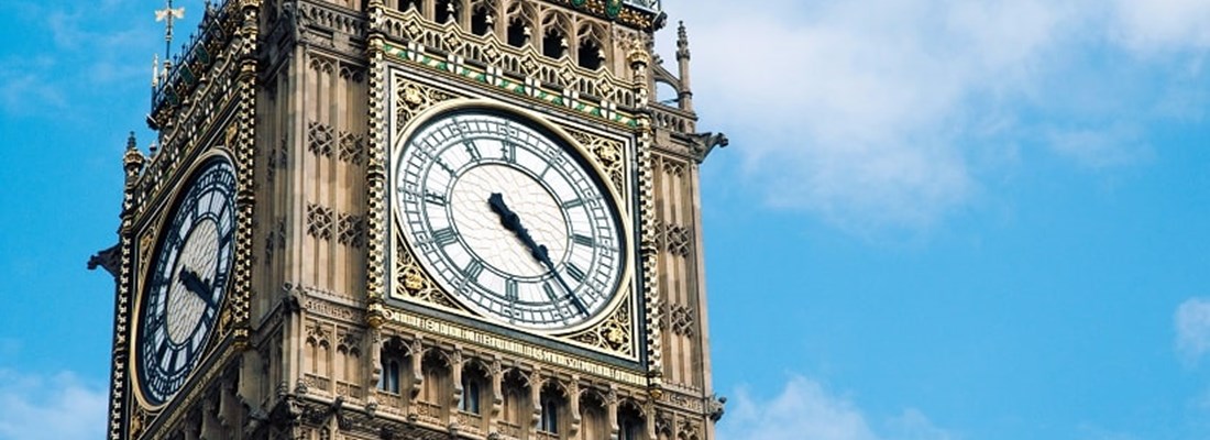 Big Ben against a blue sky.