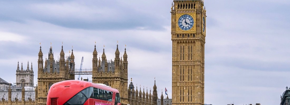 Big Ben with London Red Bus in foreground.