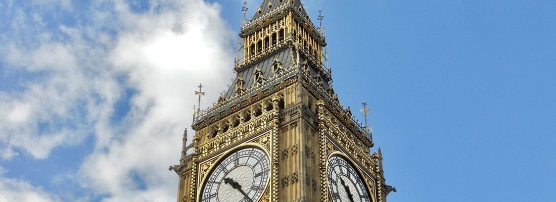 Big Ben against a blue sky.